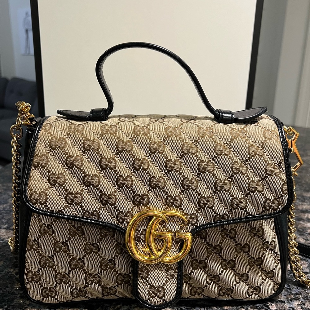 Gucci GG Marmont Top Handle Flap Bag
Diagonal Quilted GG Canvas